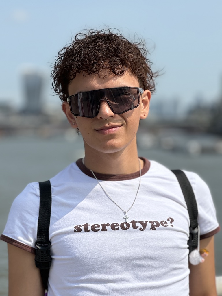 Sebas enjoying the sunshine by the River Thames in London, reflecting on his creative journey.