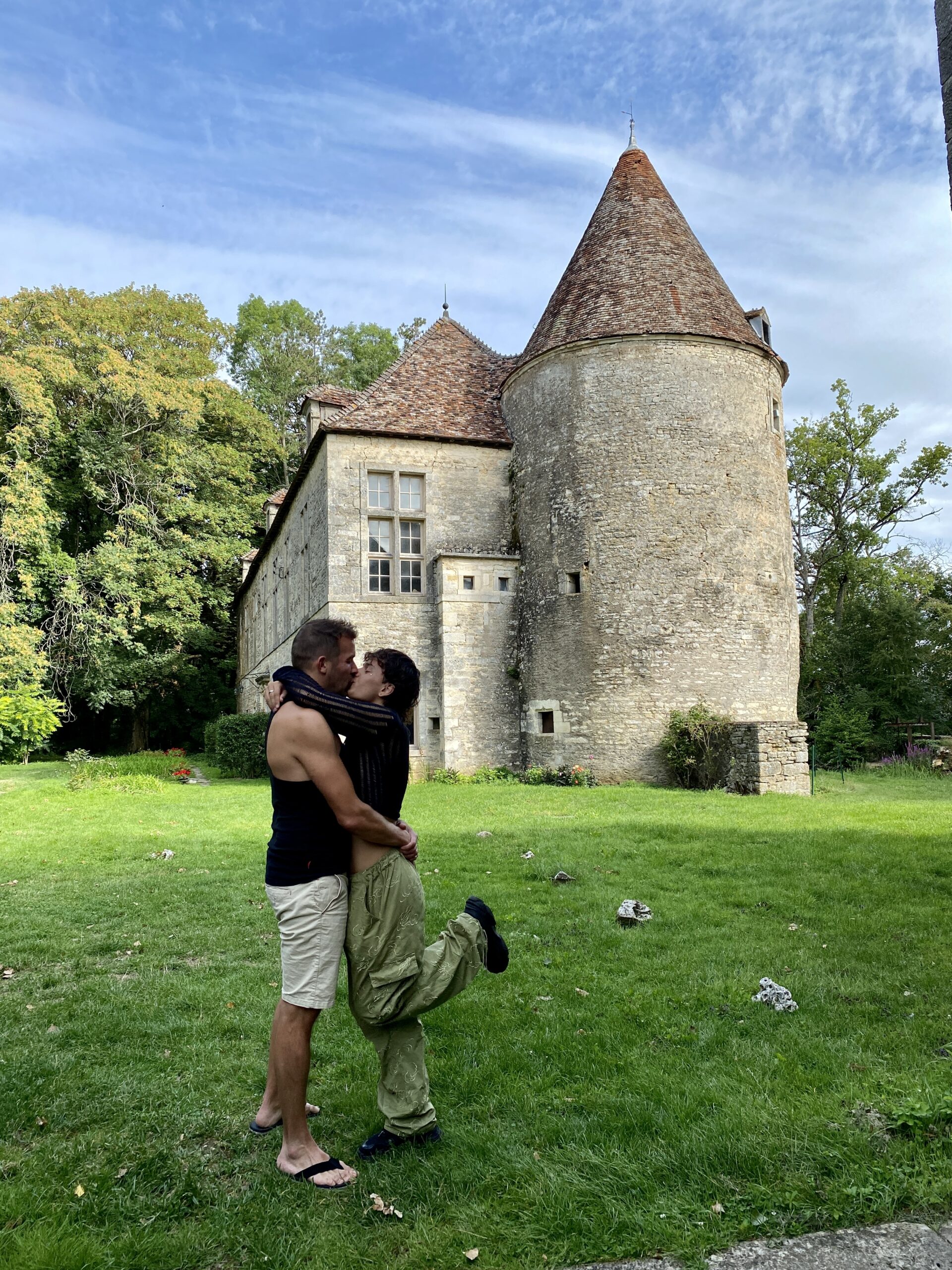 A couple on a scenic road trip through France and Spain, enjoying camping and beautiful landscapes.